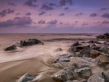 Scenic view of sea against sky during sunset