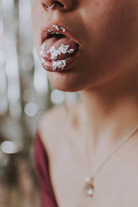 Close-up of woman dirty mouth