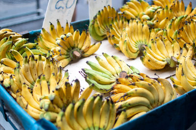 Close-up of yellow fruits in market for sale