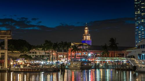 Illuminated buildings in city at night