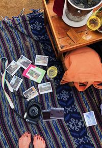 High angle view of woman reading book on table