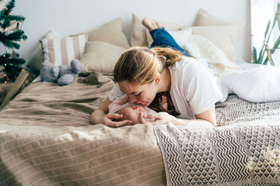 Girl lying on bed at home