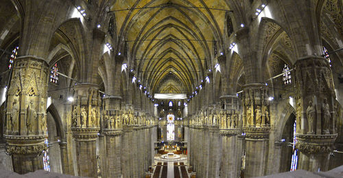 Panoramic view of illuminated ceiling of building