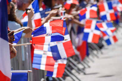 Close-up of dominican flag at the dominican day parade in new york city.