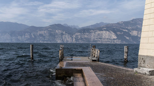 Scenic view of sea against cloudy sky