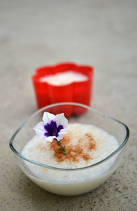 Close-up of flower in bowl on table