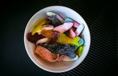 Directly above shot of gummy candies in bowl