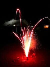 Firework display at night