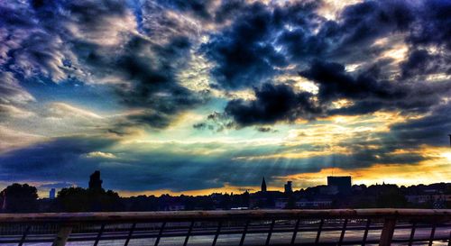 Cityscape against sky during sunset