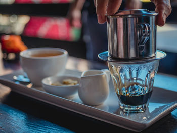 Close-up of coffee cup on table