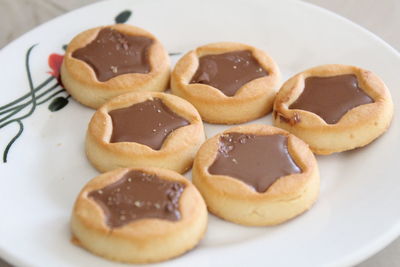 High angle view of cookies in plate on table