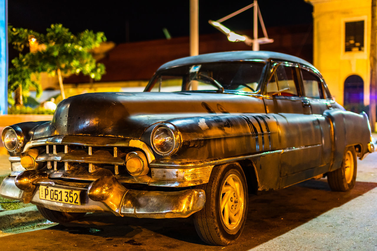 car, mode of transportation, vehicle, transportation, motor vehicle, land vehicle, vintage car, retro styled, antique car, street, architecture, taxi, city, luxury vehicle, automobile, old, night, collector's car, the past, history, no people, outdoors, travel, building exterior