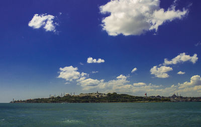 Scenic view of sea against cloudy sky