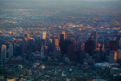 Aerial view of modern buildings in city against sky