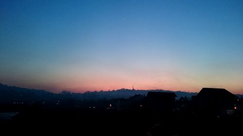 Silhouette of trees at sunset