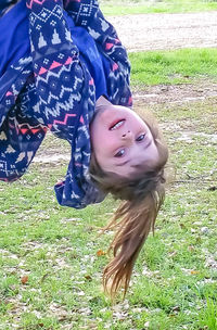 Portrait of smiling young woman in park