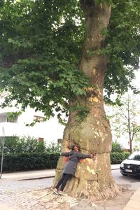 Man on tree trunk