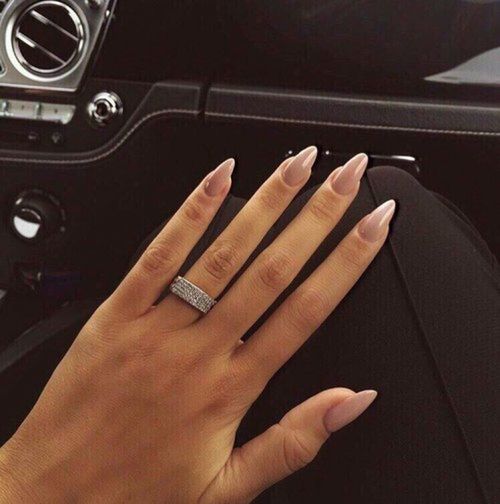 CLOSE-UP OF WOMAN'S HAND ON MIRROR