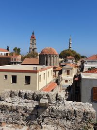 View of buildings against sky in the old town of rhodes