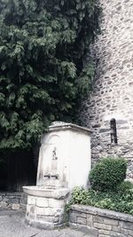 Statue against clear sky in cemetery