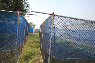 Netting on field against sky