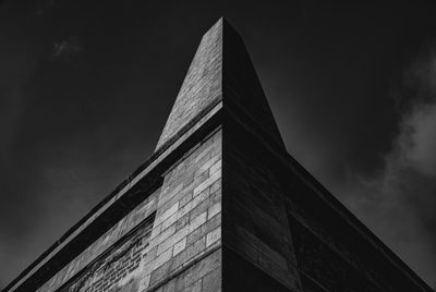 Low angle view of clock tower against sky