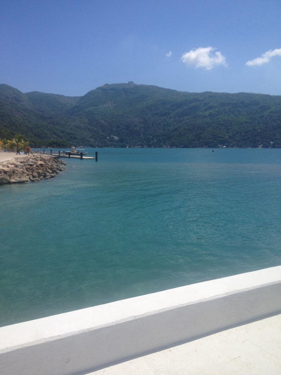 mountain, water, tranquil scene, tranquility, scenics, sky, mountain range, blue, beauty in nature, lake, nature, sea, idyllic, day, transportation, outdoors, river, rippled, calm, railing