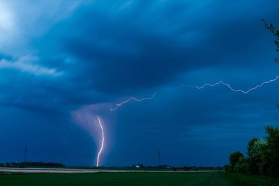 Scenic view of lightning against sky at night