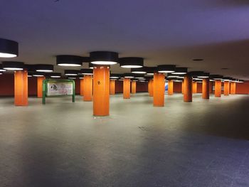 Low angle view of illuminated underground walkway