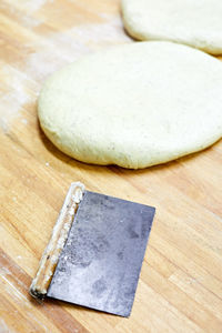 High angle view of bread on cutting board