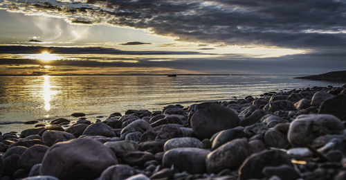 Scenic view of sea against sky during sunset