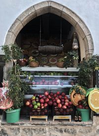 Fruits and potted plants at market stall