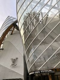 Low angle view of modern building against sky