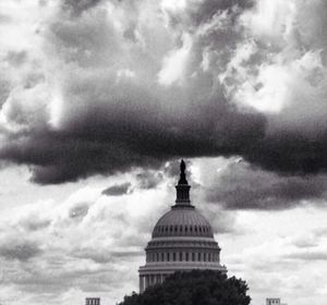 Building against cloudy sky