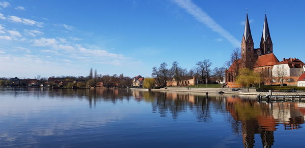 Reflection of buildings in lake