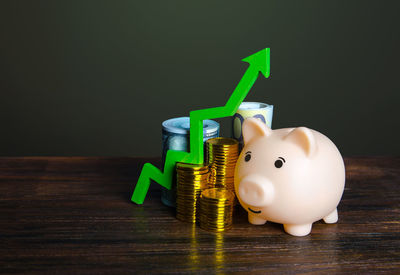 Close-up of piggy bank on table