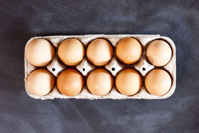 Close-up of eggs in carton