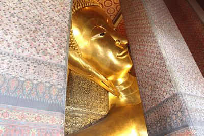 Low angle view of buddha statue