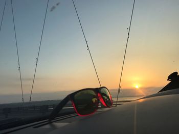 Car against sky during sunset