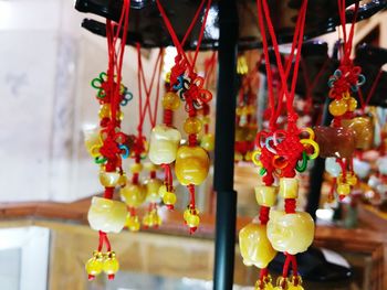 Close-up of tassels hanging for sale in market