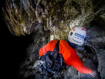 Low angle view of man on rock formation