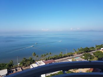 High angle view of sea against blue sky