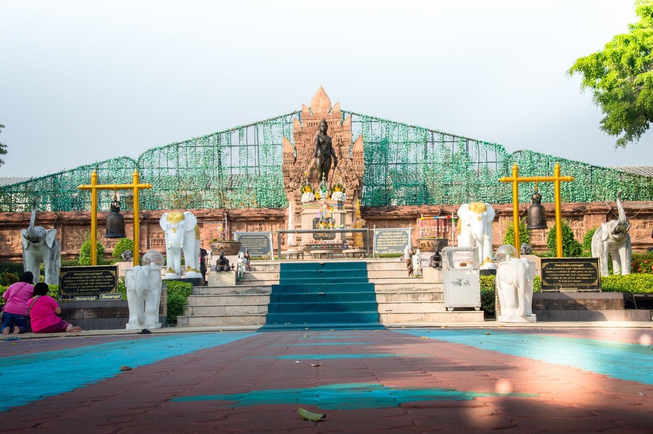 GROUP OF PEOPLE IN TEMPLE