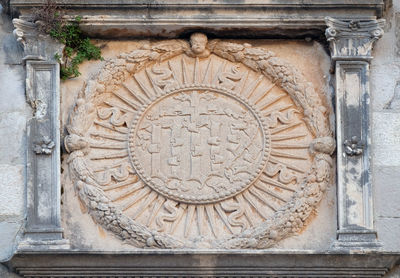 Close-up of carving on wall