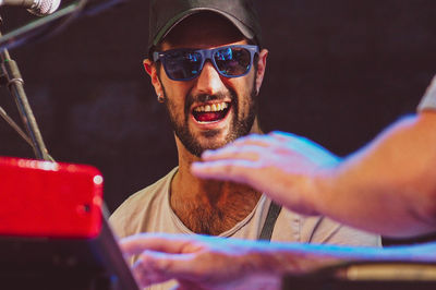 Portrait of young man wearing sunglasses