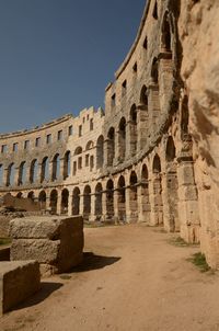Ruins of historical building against sky