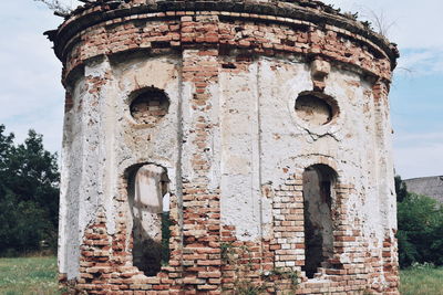 Low angle view of old building against sky