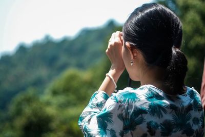 Rear view of woman in park