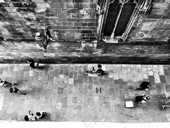 High angle view of people walking on street