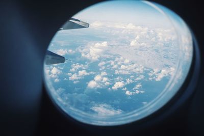 Clouds seen through airplane window